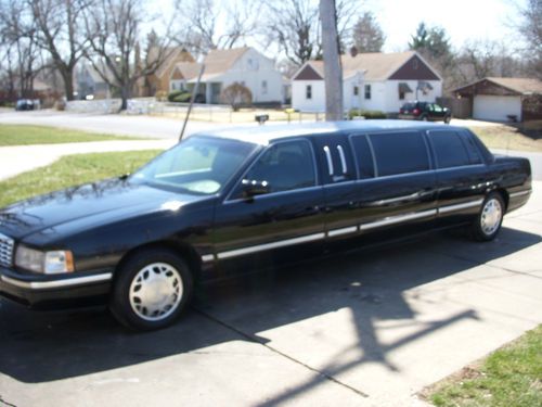 1999 cadillac deville 8 pass, 6 door black on black limousine. no reserve.