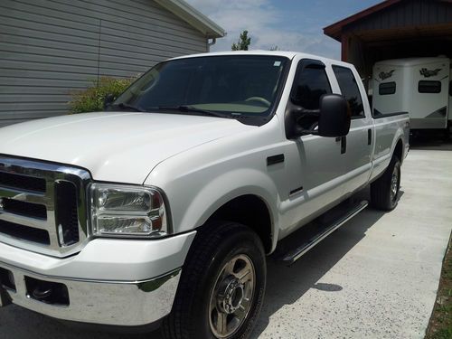 2006 f-350 4x4 fx4  lariat   8 ft long bed 4 doors wheel ball in bed and hitch