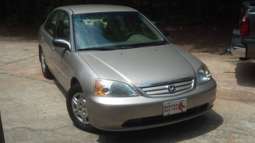2002 honda civic lx...well maintained inside and out!   5 speed manual