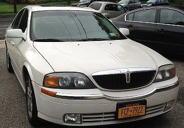 2002 lincoln ls v6 for sale. white/ chrome exterior, tan leather and custom wood