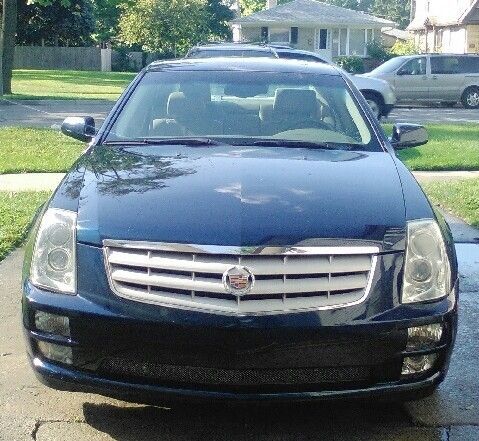 2006 cadillac sts+4 wheel drive blue/w heated seats,side air bags 4door
