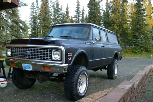 1972 gmc suburban lifted 6 inches, with a 1969 427 motor
