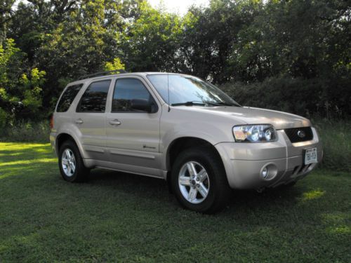 2007 ford escape hybrid! good miles, clean, great mpg, nav,sunroof, loaded!