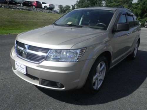 Pre-owned clean 2009 dodge journey r/t sun roof front wheel driv low miliage tan