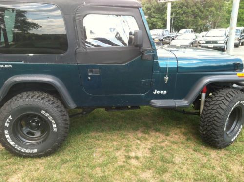 Nice jeep no rust on frame yj    lift kit 900.00 tires 700.00 rims 400.00