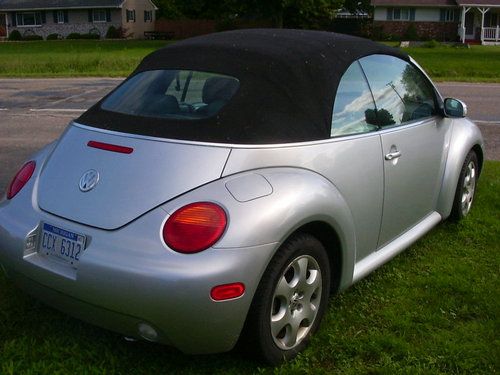 2003 vw new beetle convertible rebuilt title