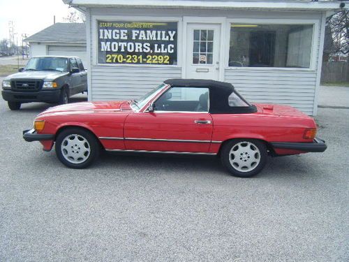 1987 mercedes 560 sl, red with both tops.