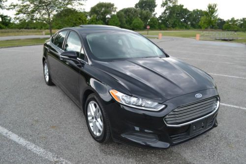2014 ford fusion se  2.5l  l4 ivct only 3700 miles/moon roof rebuilt  no reserve
