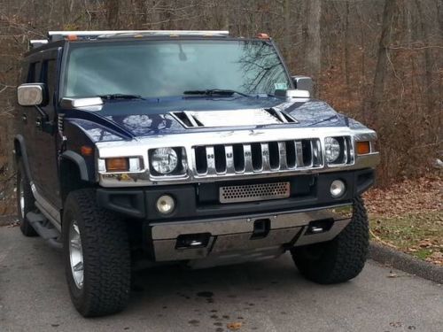 2003 hummer h2 blue with ghost flames