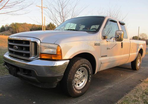 7.3 turbo diesel, only 106k clean extended cab 4x2 xlt. 23 mpg +