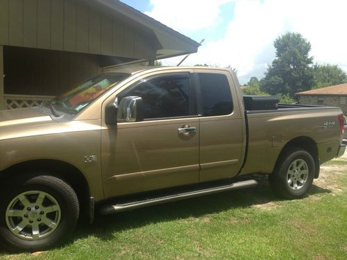 2004 nissan titan 4x4 towing package cruise control cold ac only 93k on it