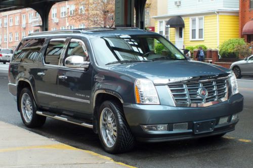 2010 customized cadillac escalade esv - 22 inch rims, tvs in headrests and more