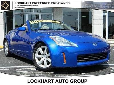 Touring 6 speed manual convertible low mileage rwd heated front seats