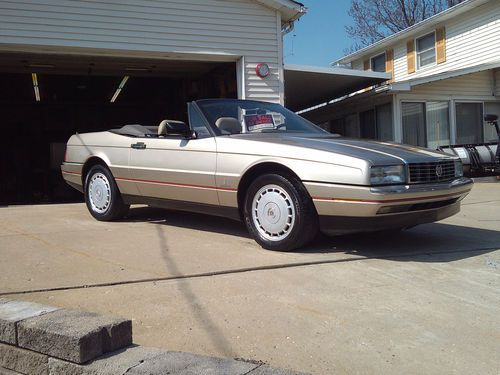 Cadillac allante convertible hardtop gold in color with beige leather inter