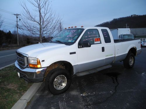 2000 ford f-250 4x4 ext. cab long bed  v-8 auto
