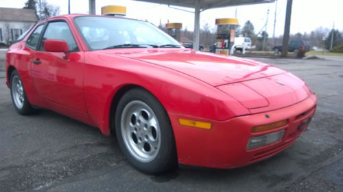 Red 1986 porsche 944 turbo. autothority chips. tubular control arms.