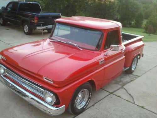 This is a 1965 red chevy c10 in good condition