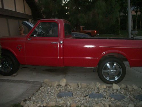 1969 chevy c10 pickup 20 inch wheels,chrome door panels,carpet,bumbers,and more
