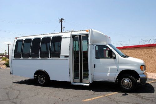 E 450 shuttle bus van 21 passenger like new lo miles cost $77k new rsrv $6,500,0