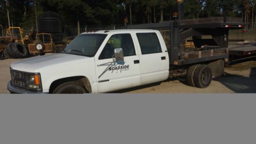 '94 chevy crew cab 3500. 8 ft flat bed with 5th wheel. 262,000 mi. 454 gas, at