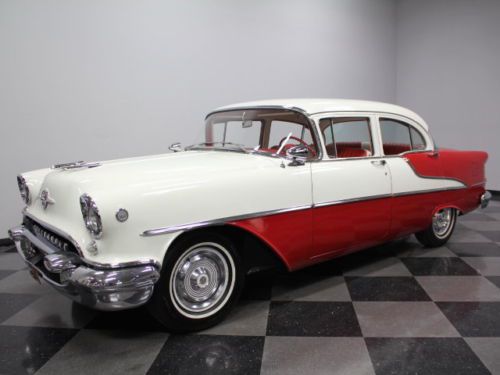 Beautiful white over red, 322 v8, automatic, power steering,  new interior, nice