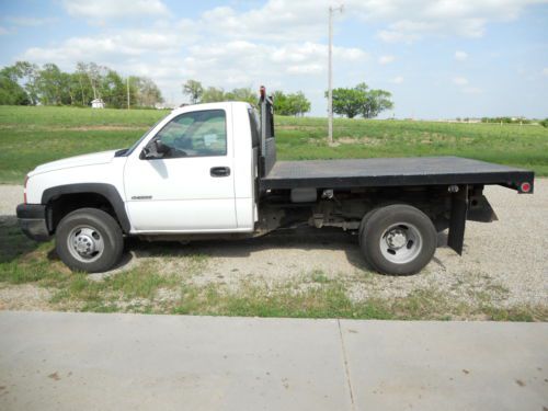 2006 chevrolet c3500 flat bed with lift dump, low miles