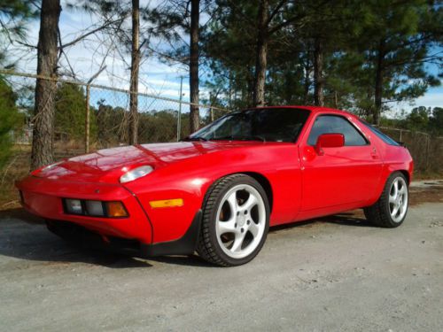 1984 porsche 928s rear 2+2, 5 speed, red with black. good condition......