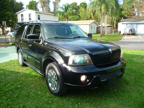 2004 black navigator with navigation and new tires.. no reserve