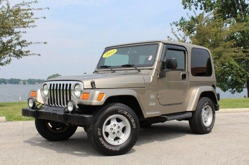 5 speed 4.0l inline 6 sahara ed hard top cold a/c clean no issues we finance