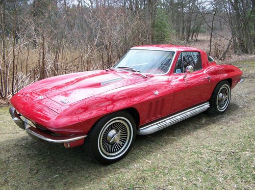 1966 corvette coupe, 327, auto, ac, red with red leather int, headrests  loaded!