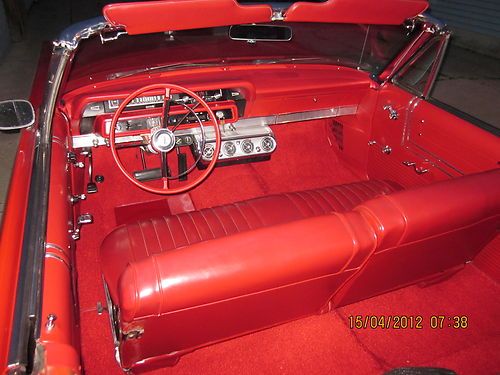 Bright red interior with rangoon red exterior convertible 390/330 hp v8 .ac