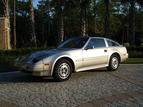 Silver , leather, excellent, t-tops,power seats, alarm,cruise,2nd owner