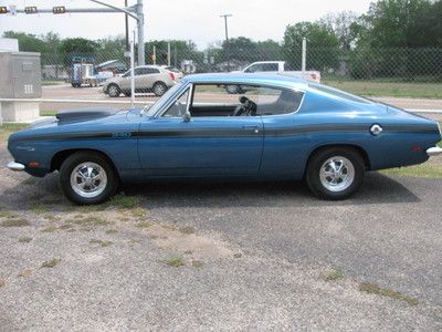 1969 cuda fastback hp 340 engine,auto.8 3/4,3:23,blue/black console nice driver