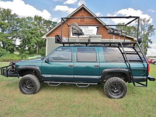4x4 hunting vehicle with roof rack, front &amp; back spotlights, ranch hand bumpers