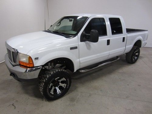 01 ford f250 lariat 6.8l v10  4x4 crew cab short bed  lifted 96k low miles 80pix