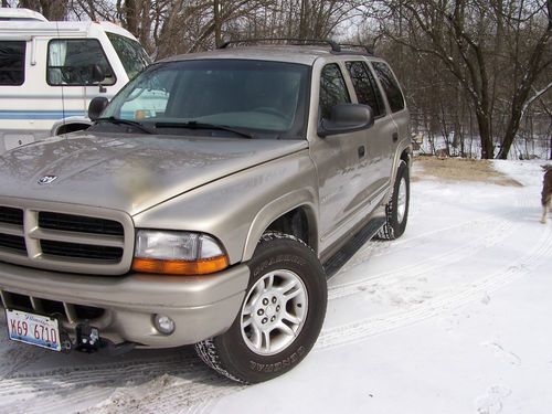 2001 dodge durango slt 4x4 new motor with less then 30,000 miles. new tires,