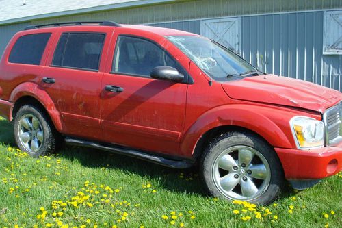 2005 dodge durango slt 4x4 red rolled over but runs use for parts
