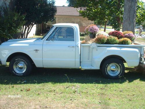 All original. matching vins. 1967 chevy c-10 white step-side in-line 6 cylinder.