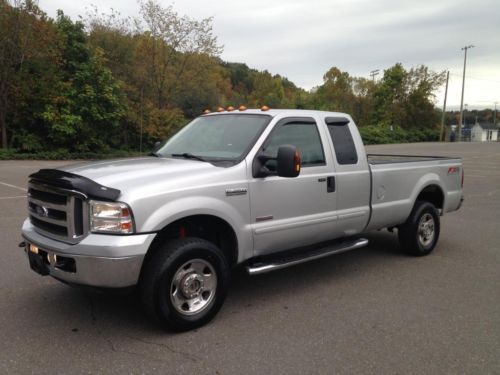 Extended cab - long bed - 4x4 - lariat - powerstroke turbo diesel - no reserve