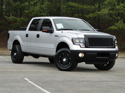 Silver xlt 5.4l v8 crew cab 4 door lifted custom nitto exhaust aux 2wd leather