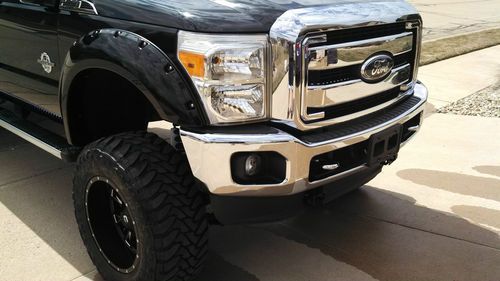 2011 ford f350 lariat super duty diesel crew cab with 8' lift and extras
