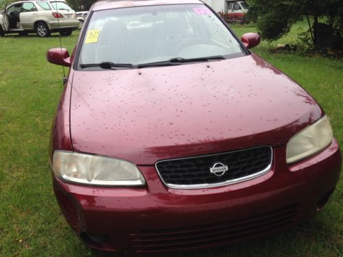 Nissan sentra red 4dr automatic