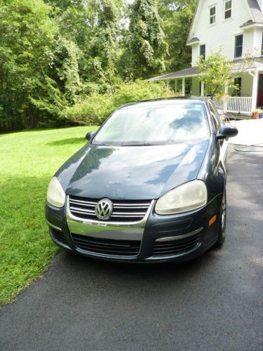 2005 volkswagon jetta navy blue 2.5l 141.000 miles clear title one owner vg cond