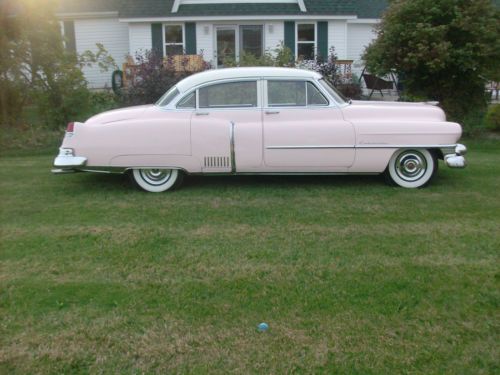 1951 pink cadillac fleetwood 4-door sedan