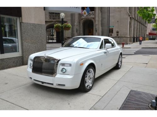 2010 rolls royce phantom coupe. english white with moccasin.