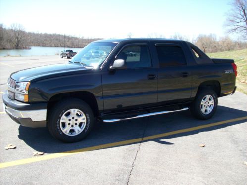 2003 chevy avalanche 1500 z71 4wd 5.3l with * low miles*