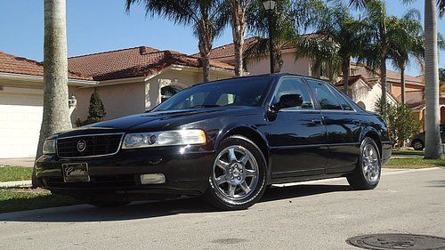 2002 cadillac seville sts all black 17 inch xenon , moon roof 76k no reserve