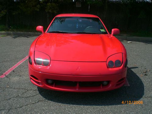 95' 3000gt, 5 speed manual, caracas red, black leather interior, (low reserve)!!