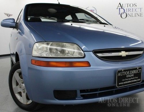 We finance 05 aveo ls auto 26k low miles cloth bucket seats fm stereo one owner