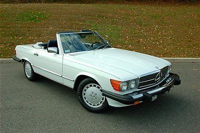 1989 mercedes benz 560sl in white with blue leather with 24k miles!!!